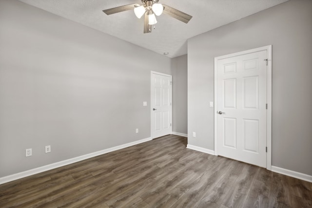 unfurnished bedroom featuring a textured ceiling, ceiling fan, and hardwood / wood-style floors