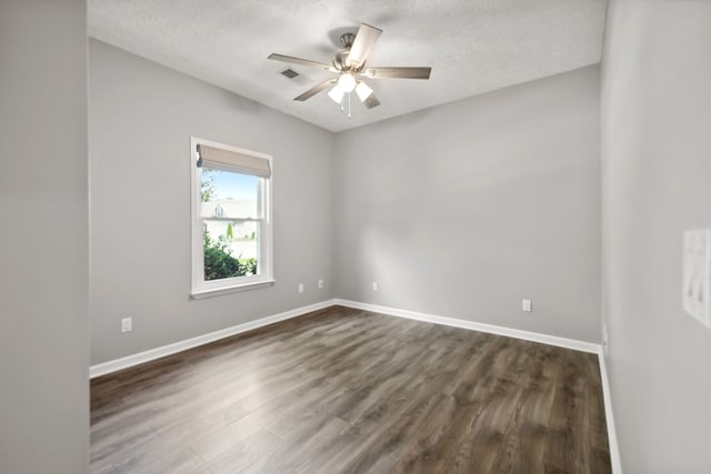 unfurnished room featuring a textured ceiling, ceiling fan, and hardwood / wood-style floors