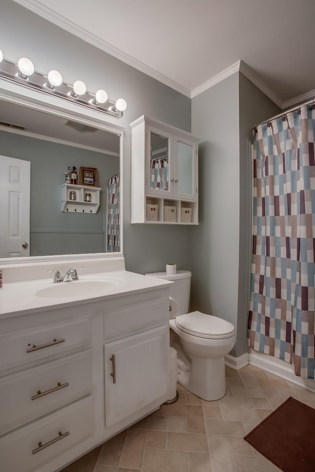 bathroom with tile patterned floors, toilet, ornamental molding, vanity, and curtained shower