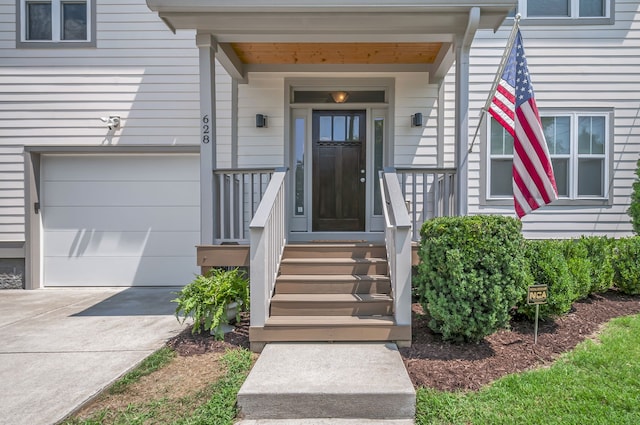 entrance to property featuring a garage