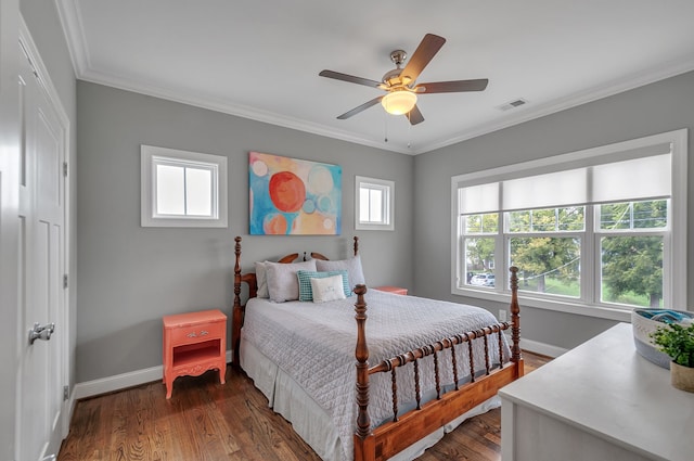 bedroom featuring dark hardwood / wood-style flooring, crown molding, multiple windows, and ceiling fan