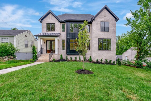 view of front of property with a front lawn