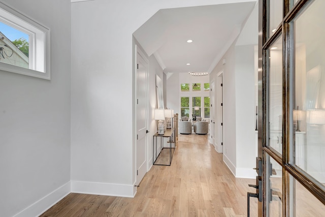 corridor with light wood-type flooring