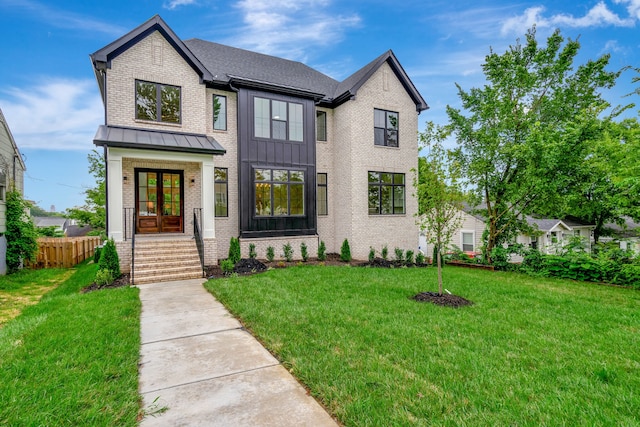 view of front facade featuring a front yard