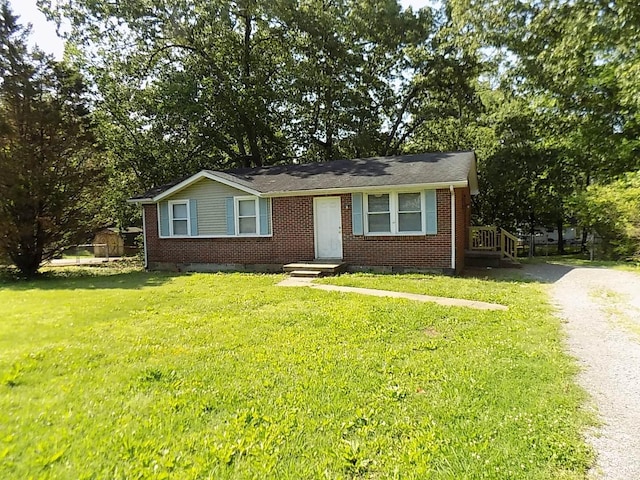 ranch-style house with a front yard