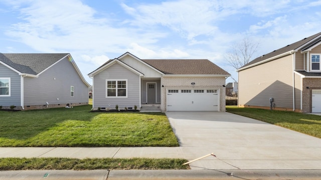 view of front of property featuring a front lawn and a garage