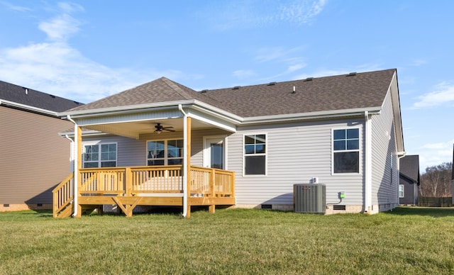 back of house featuring a deck, a yard, ceiling fan, and central AC