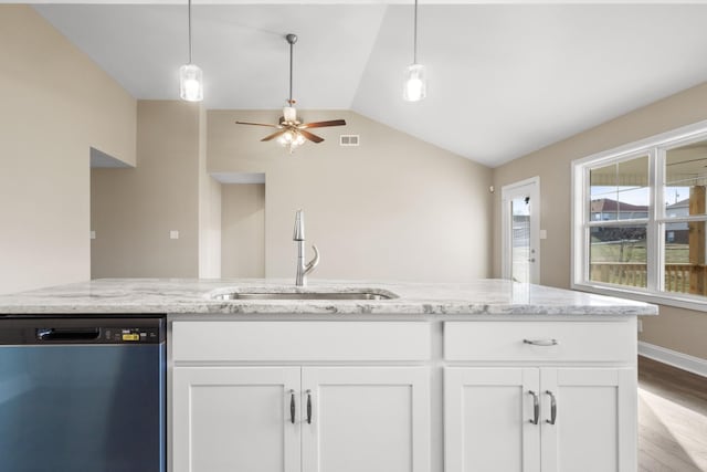 kitchen featuring ceiling fan, light stone counters, sink, white cabinetry, and stainless steel dishwasher