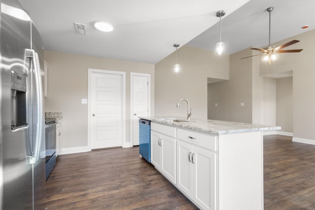 kitchen with a center island with sink, white cabinetry, pendant lighting, and appliances with stainless steel finishes