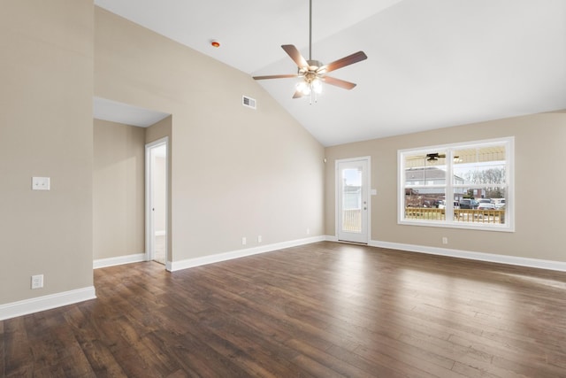 unfurnished living room with ceiling fan, vaulted ceiling, and dark hardwood / wood-style floors