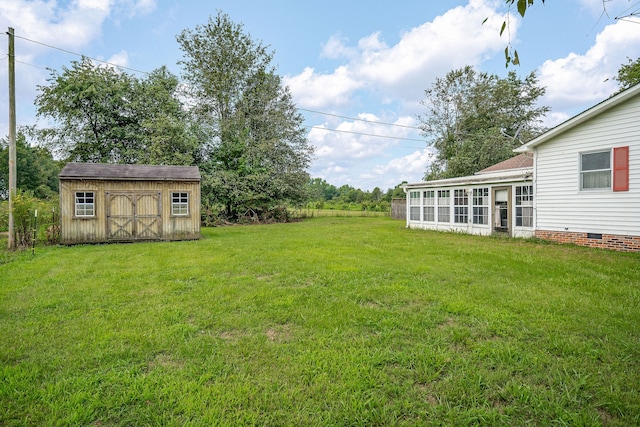 view of yard with a storage shed