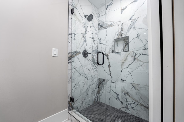 bathroom featuring an enclosed shower