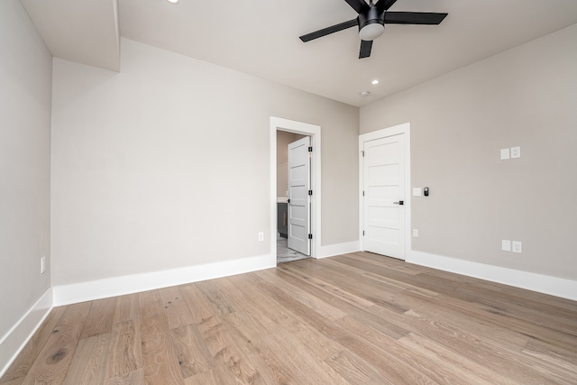 unfurnished bedroom with light wood-type flooring and ceiling fan