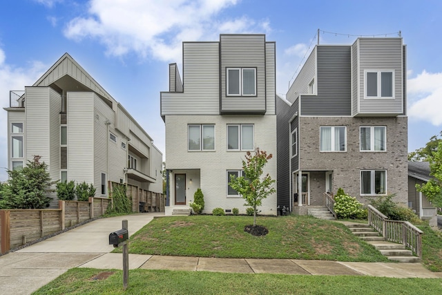 view of front of property with a front lawn