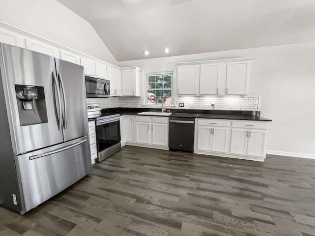 kitchen with white cabinetry, appliances with stainless steel finishes, and sink