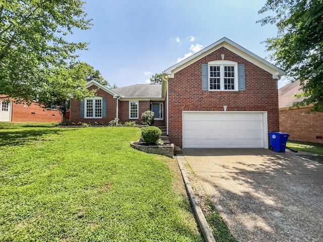 view of front of house featuring a garage and a front lawn