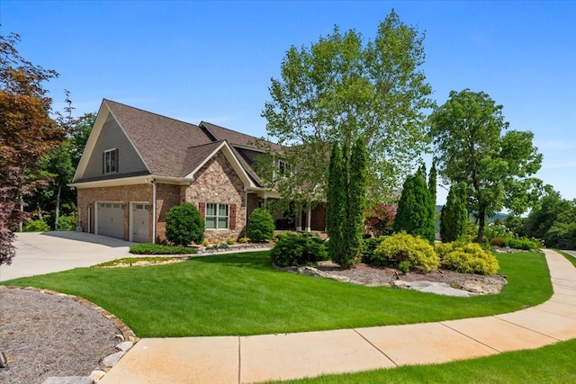 craftsman-style house with a garage and a front yard