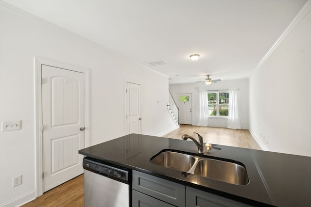 kitchen with dishwasher, light wood-type flooring, ceiling fan, sink, and ornamental molding