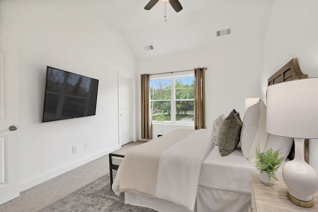 bedroom featuring ceiling fan, high vaulted ceiling, and light carpet