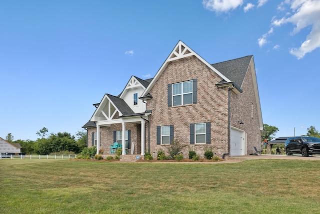 craftsman-style house with a garage and a front yard