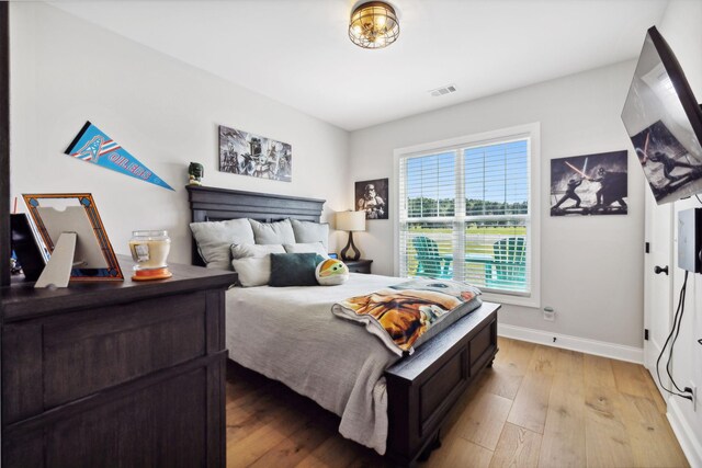 bedroom featuring light wood-type flooring