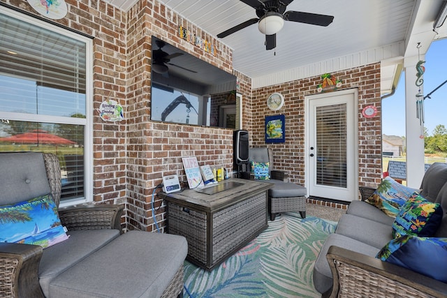 view of patio / terrace featuring an outdoor living space and ceiling fan