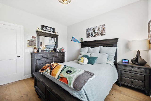 bedroom with light wood-style flooring