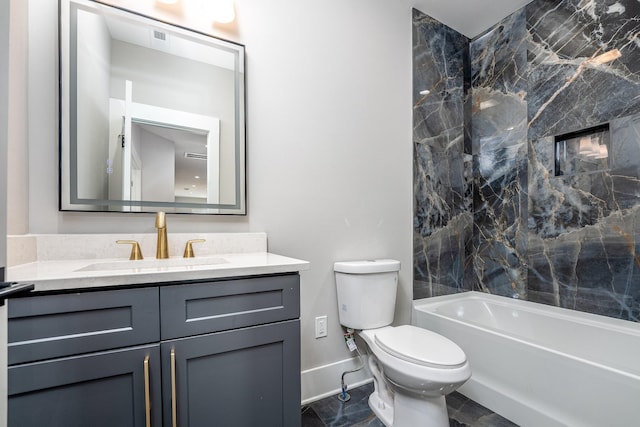 bathroom featuring bathtub / shower combination, vanity, toilet, and baseboards