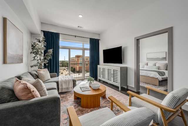 living room with hardwood / wood-style flooring