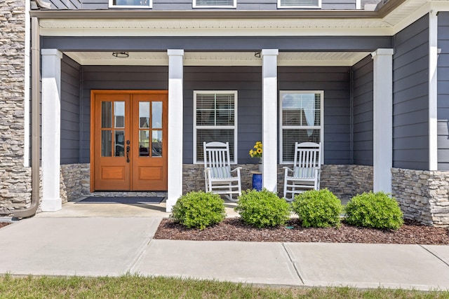 doorway to property with french doors and covered porch