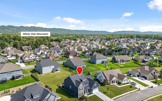 aerial view featuring a mountain view