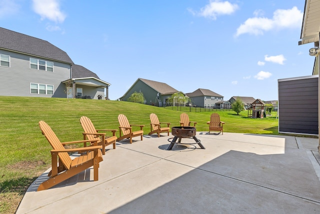 view of patio / terrace with a fire pit