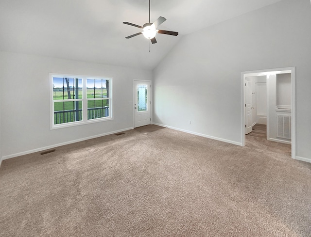 unfurnished room featuring high vaulted ceiling, ceiling fan, and carpet