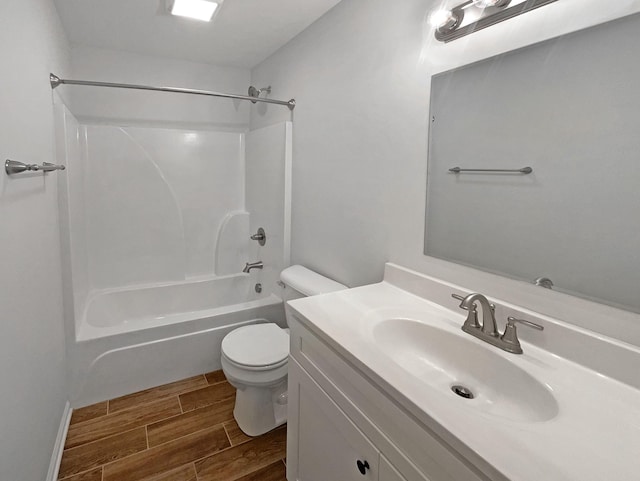 full bathroom featuring shower / washtub combination, vanity, and toilet