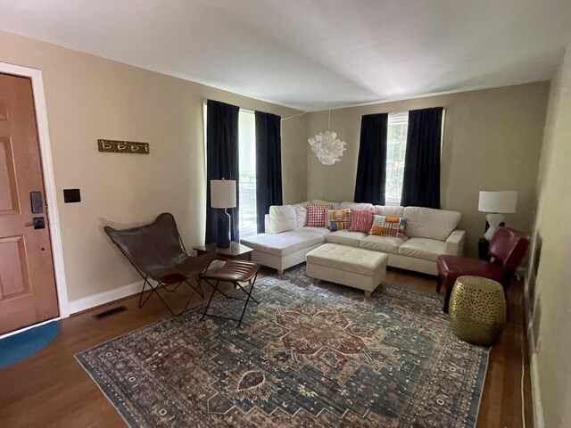 living room featuring plenty of natural light and hardwood / wood-style floors