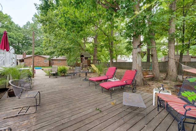 wooden deck with a playground