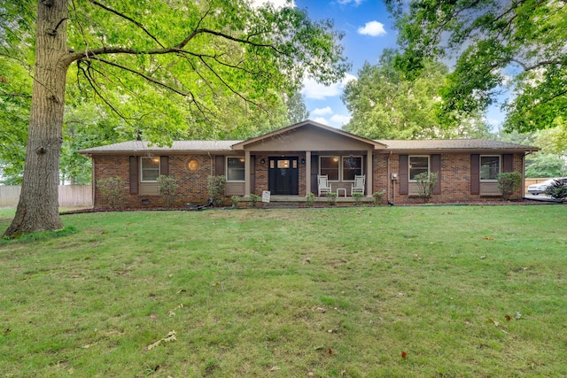 ranch-style house featuring a front lawn