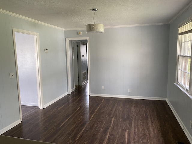 467 Owendale Dr, Antioch, TN 37013 - empty room featuring a textured ceiling, baseboards, visible vents, ornamental molding, and dark wood-style flooring