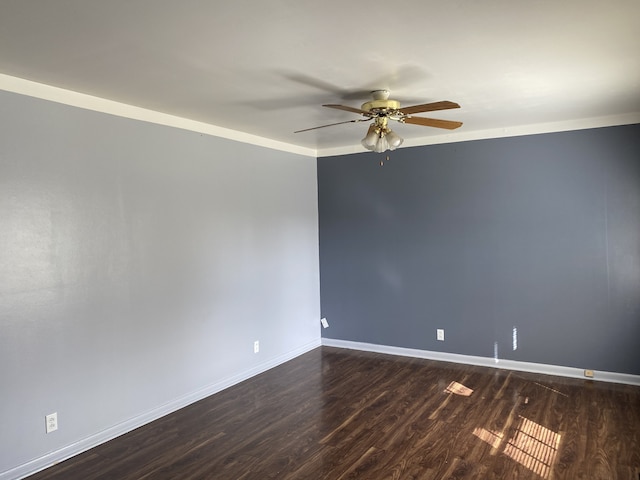 unfurnished room featuring ceiling fan, wood-type flooring, and ornamental molding