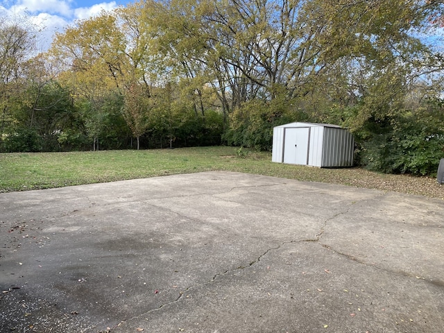 view of patio / terrace featuring a storage unit