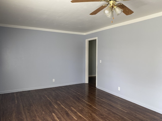 spare room featuring ornamental molding, wood-type flooring, and ceiling fan