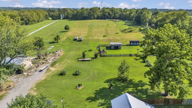 birds eye view of property featuring a rural view