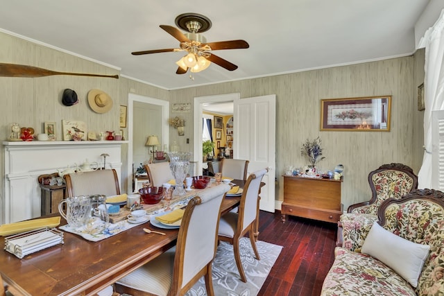 dining area featuring ceiling fan, dark hardwood / wood-style flooring, and ornamental molding