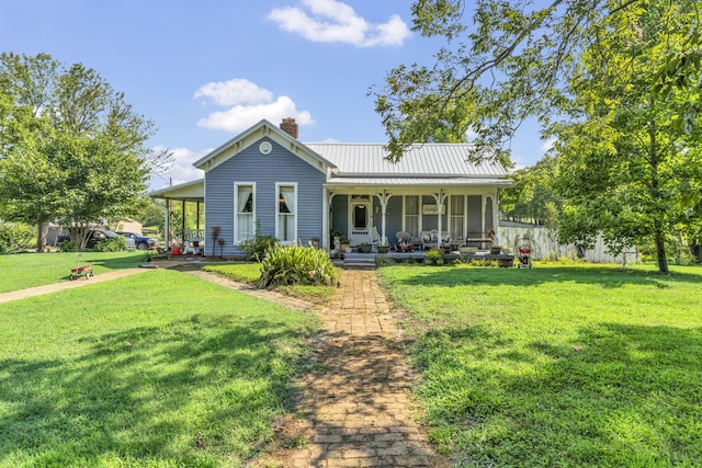 view of front of property with a porch and a front lawn