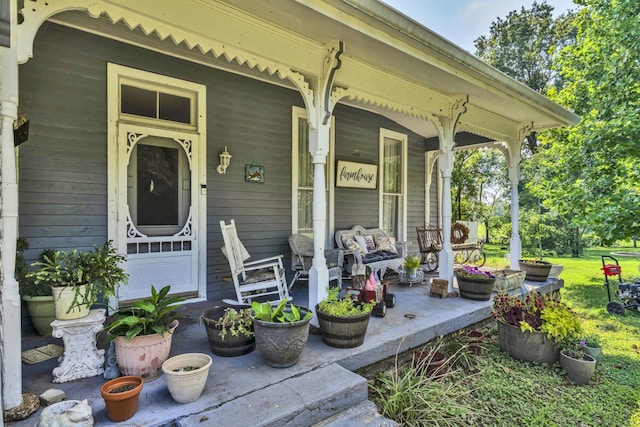 doorway to property featuring covered porch