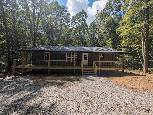 manufactured / mobile home with a wooden deck