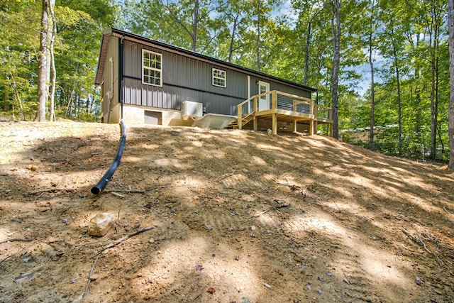 view of front of home with a wooden deck