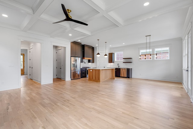 unfurnished living room with ceiling fan, coffered ceiling, light hardwood / wood-style flooring, and beamed ceiling