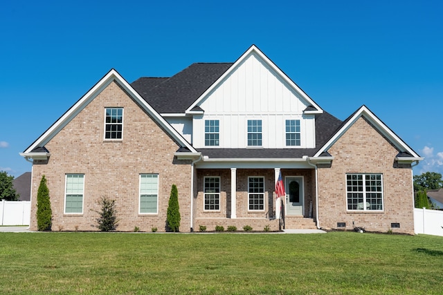 view of front of home with a front yard