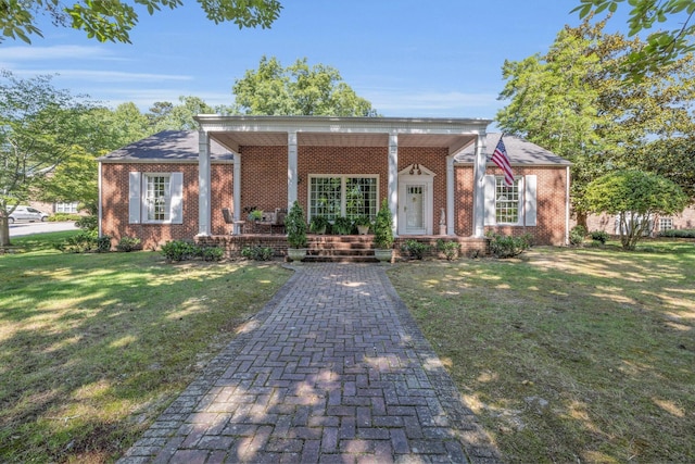 view of front of house featuring a front lawn and a porch